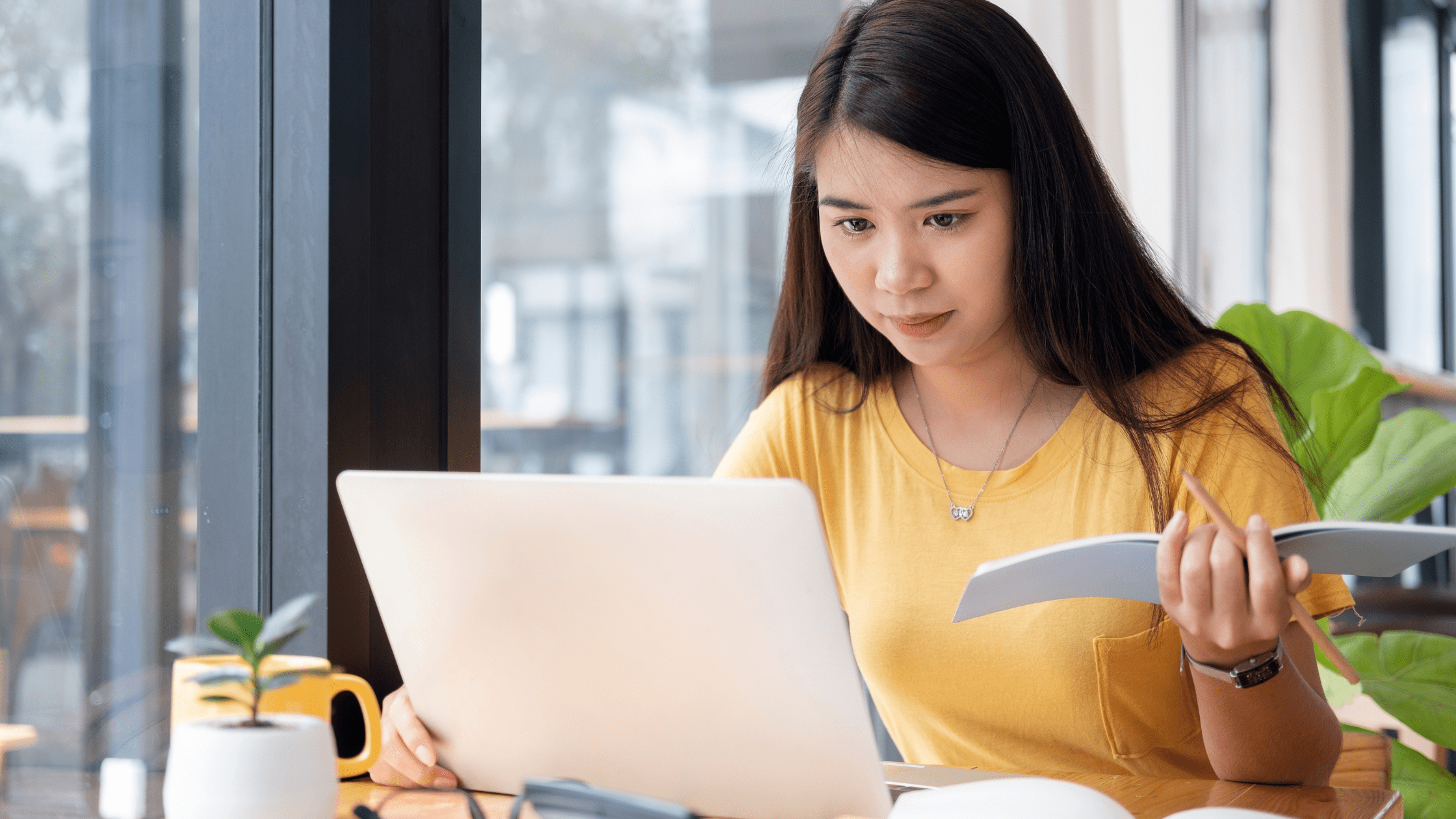 Medical school student studying for USMLE exams in front of a laptop using TrueLearn and UWorld.